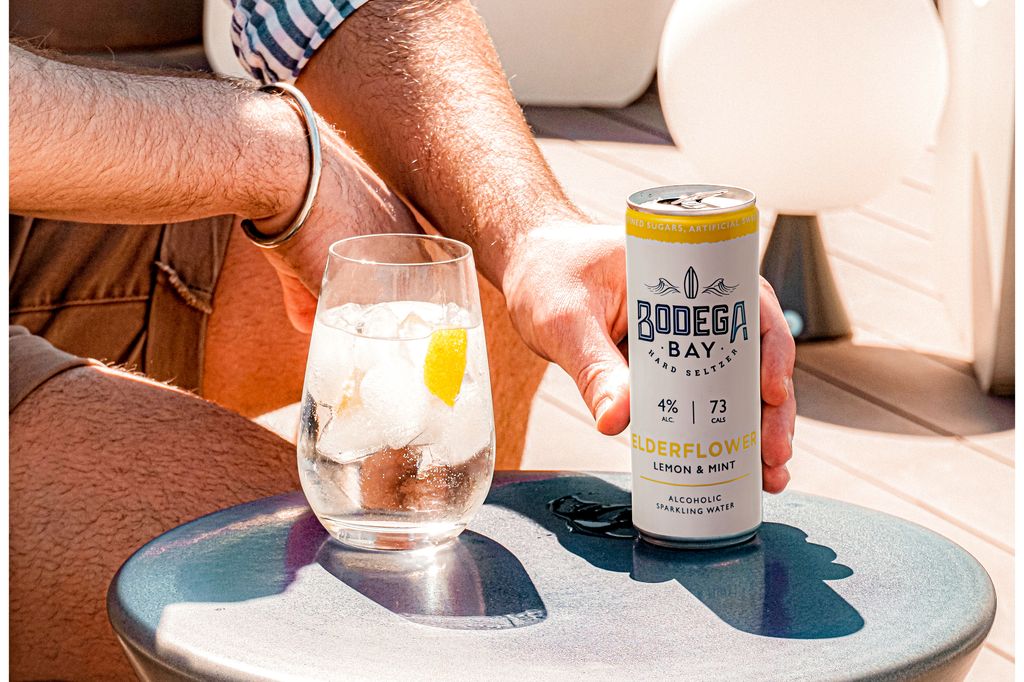 Can of Bodega Bay hard seltzer with a glass